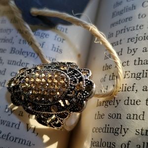 Silver and gold toned jeweled ring